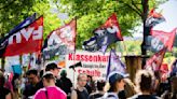 German employers urge longer hours as workers celebrate Workers' Day