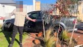 Driver's unbelievable response after he crashed into a front yard