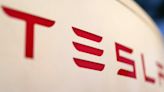 Tesla 1Q profit falls 55%, but stock jumps amid move to speed production of cheaper vehicles