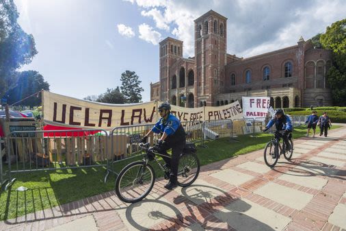 Student anti-war protesters dig in as faculties condemn university leadership over calling police - The Boston Globe