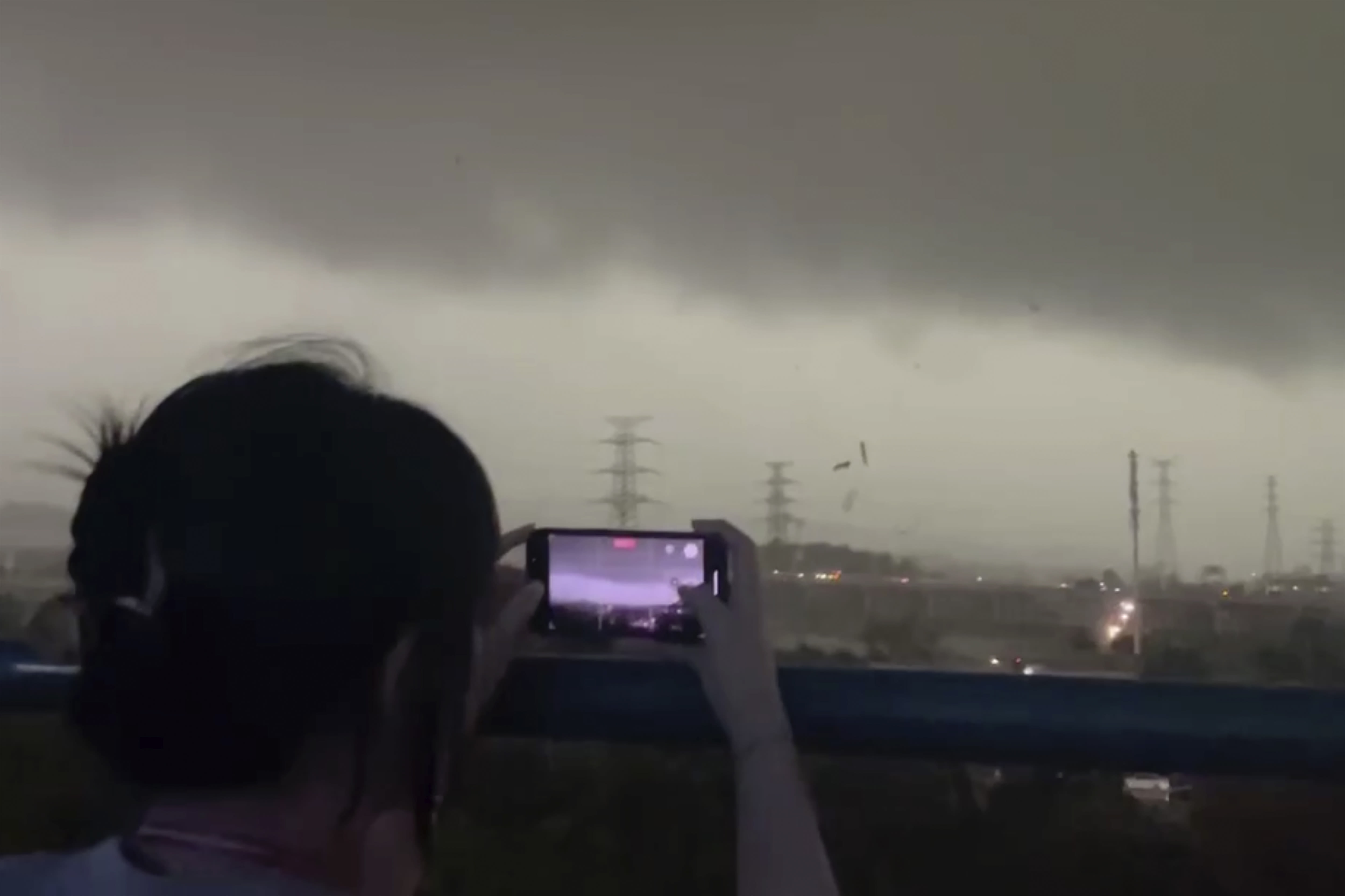 A tornado in southern China kills 5 people and damages factories in the metropolis of Guangzhou