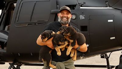 Moment Rottweiler puppies run wild in rescue helicopter