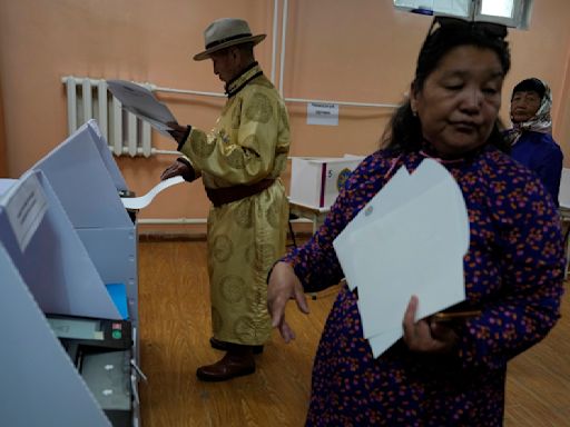 The young democracy of Mongolia begins voting for an expanded 126-seat parliament