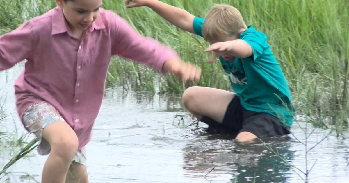 A wet and Muddy 99th Annual Chincoteague Pony Swim