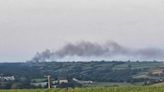 Toxic smoke billows across A38 as tanker fire causes chaos