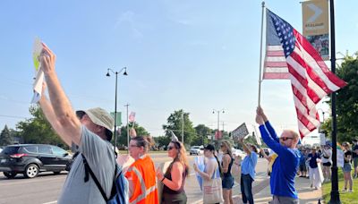 Anti-Trump protesters gather in downtown St. Cloud during Trump rally