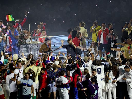 Olympics: Phoenix’s Thomas Mars Says He Worried for Overjoyed Athletes Swarming Stage at the Closing Ceremony