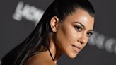 Kourtney Kardashian Shows Off Baby Bump In Skimpy Kiwi Green swimsuit