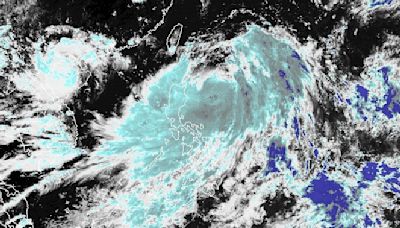 Carina strengthens into typhoon while 'meandering' offshore