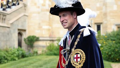 Prince William beams in royal procession - as 'super trooper' Kate stays home