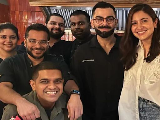 Anushka Sharma-Virat Kohli are all smiles as they happily pose with fans during their dinner date in Mumbai; PICS