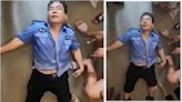 Old photo of collapsed police officer falsely linked to China floods