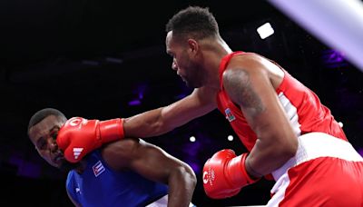 Cuban defector halts boxer's quest for 3rd gold