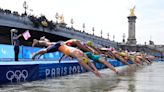 5 photos of Olympic triathletes swimming in the yucky Seine River