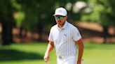 Rickie Fowler puts his wedge to work Saturday, picking up a snake at the Wells Fargo Championship