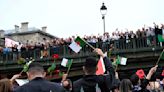 Algerians honor victims of colonial-era French crackdown at Paris Olympics ceremony