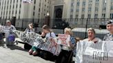 Wives of conscripted Russians picket in front of Russia's Defence Ministry, demanding that their husbands be brought back from war – photos