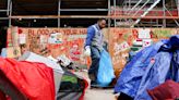 UCLA clears mounds of trash left from pro-Palestinian encampment, counter-protesters