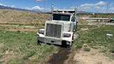 Dump truck leaks fuel following crash in Colorado Springs, hazmat responds