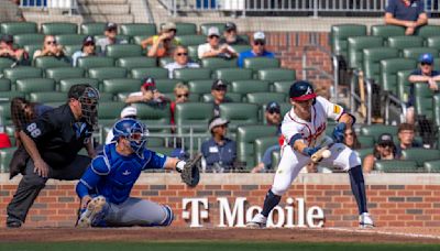 Braves rally to beat Blue Jays 4-3 in the 11th, move into a tie with Mets for final NL wild card