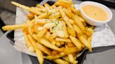 Crab Fries Are The Spicy, Cheesy Twist On Regular Fries That You'll Wonder How You Lived Without