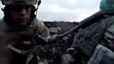 A dramatic video shows a famed Ukrainian unit dodging grenades and shooting Russian soldiers in close-combat trench warfare