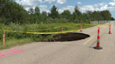 'A long way down': Road commission tells people to steer clear of large sinkhole