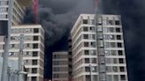 Firefighters battle huge east London fire with smoke seen across city