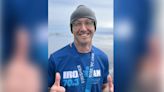 Victoria artist receives medal he designed after completing ironman