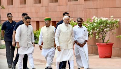 Newly confident opposition stages walkout as Modi address India’s new parliament