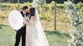 A couple started planning their winery wedding without a set budget. Here's how their $73,000 day came together, from a pricey venue to DIY decor.