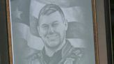 Northeast Ohio artist presents portrait of fallen officer Jacob Derbin to Euclid police