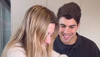 Christian Petracca's fiancée Bella helps him cook after surgery