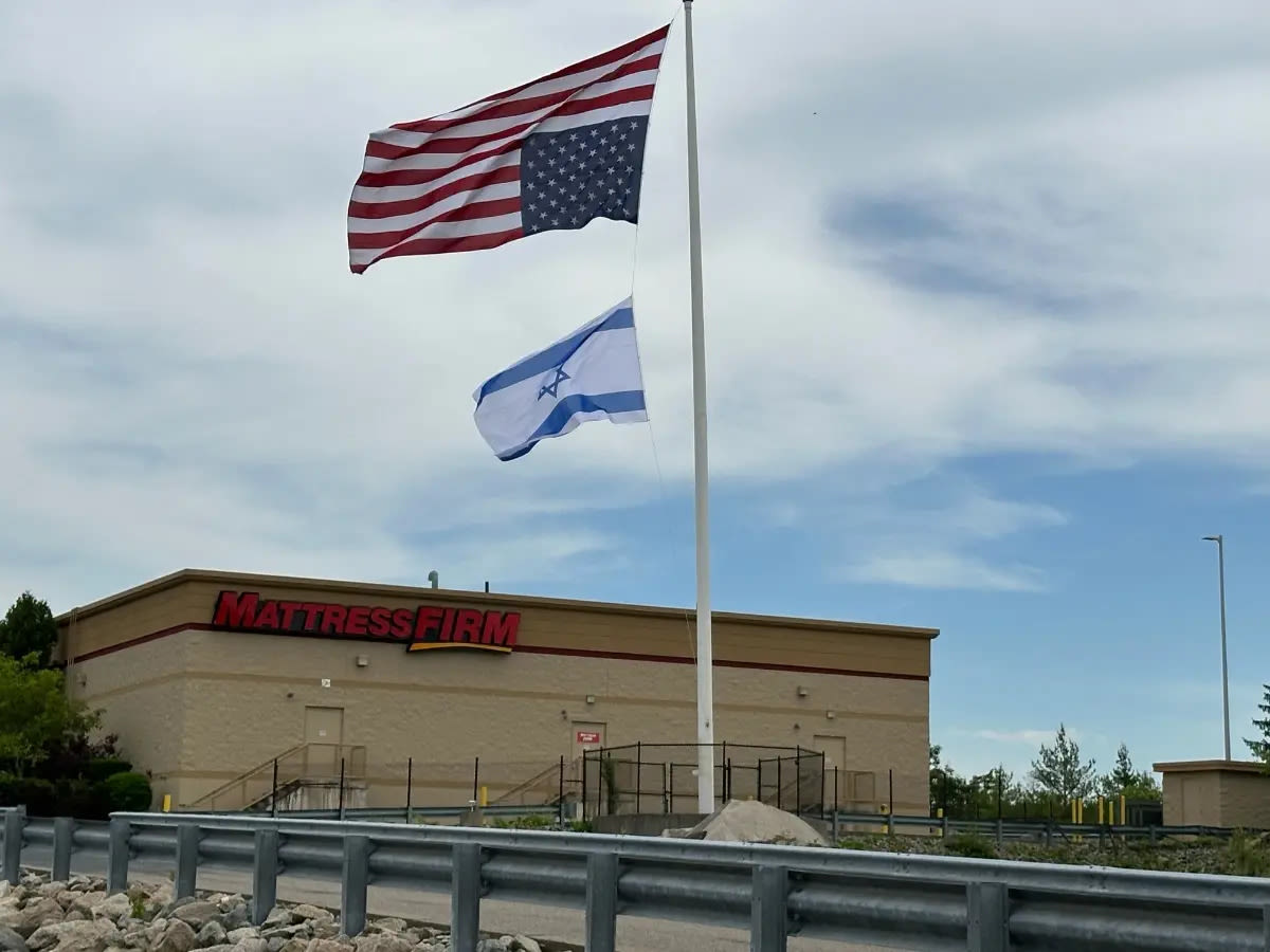 Milford businessman flew the American flag upside-down because U.S. is 'in distress'