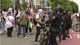 8 arrested as protest disrupts Grand Floral Parade
