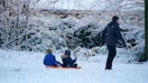 In Pictures: Snowy scenes bring delight and delays to parts of UK