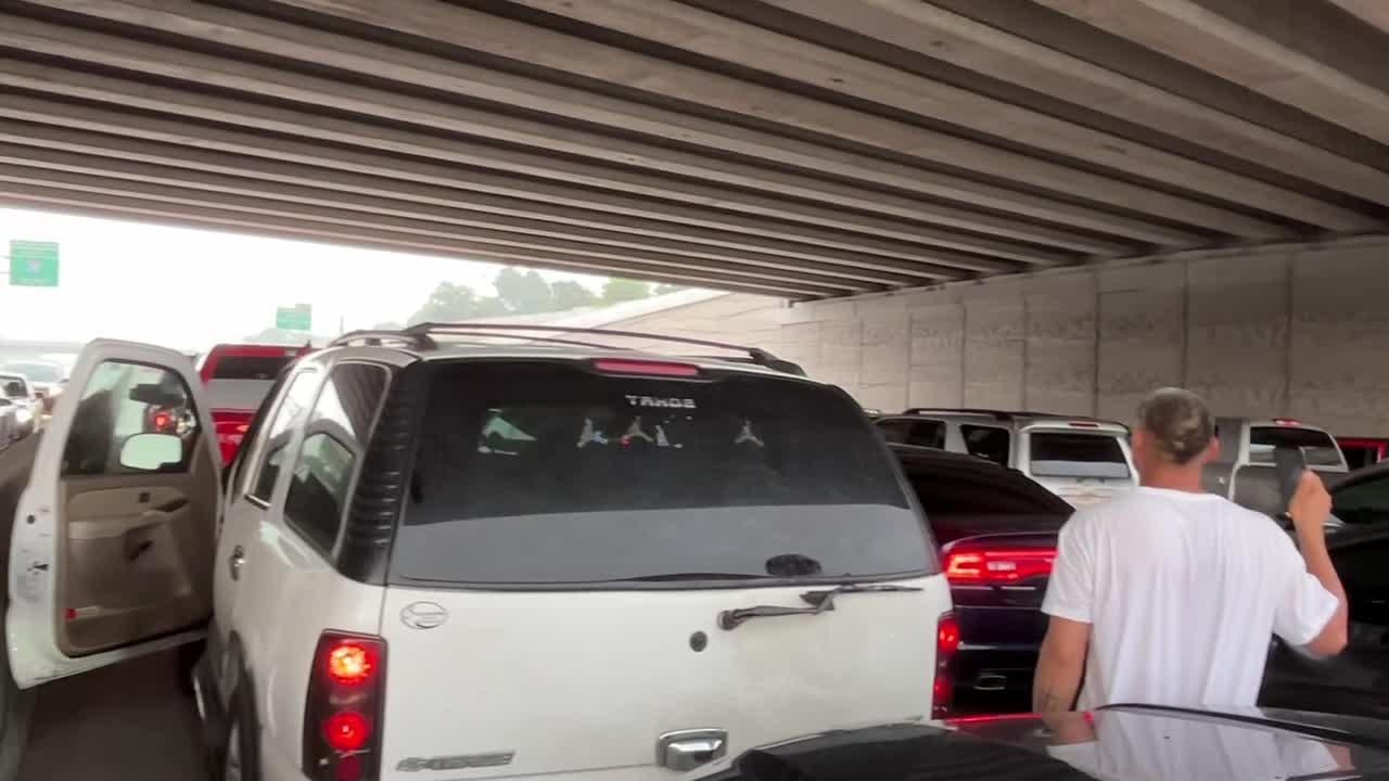 Dallas weather: Cars camp out under overpass to avoid hail
