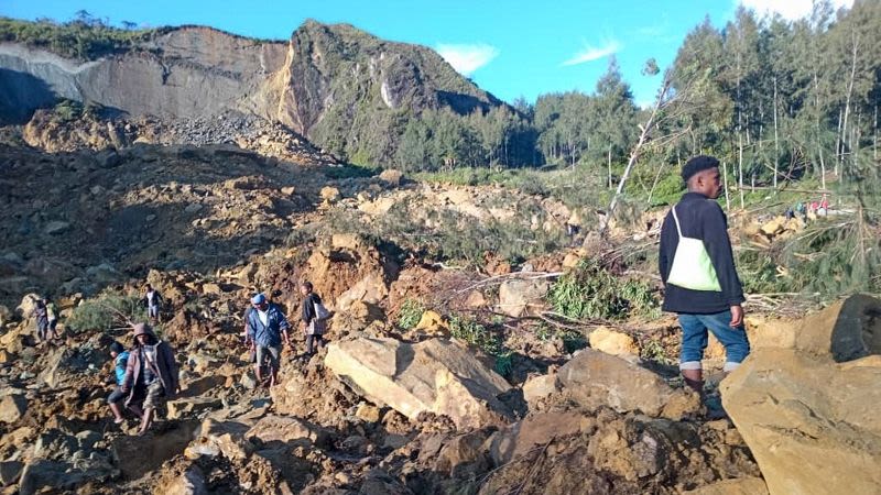 Rescuers scramble to reach remote region of Papua New Guinea hit by deadly landslide