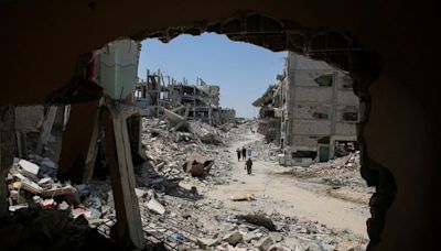 After a year of war, Gazans wonder how to deal with tonnes of rubble