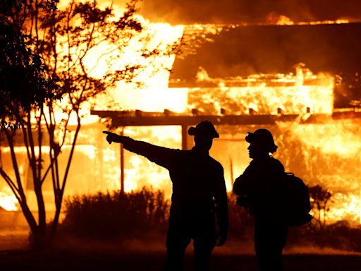 Man charged with starting massive wildfire in California as blazes burn across the West