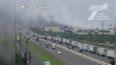 Warehouse fire under control, traffic congestion continues on I-35