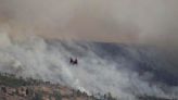 Two fires, fueled by heat and dry winds, inch toward communities in Sierra and Fresno counties