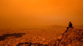 See Athens Blanketed by Orange Haze Due to Sahara Dust Storm