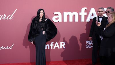 Cher turns back time, with Nick Jonas, Demi Moore, at amfAR Cannes Gala