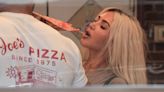 Kim Kardashian enjoys a good slice of New York pizza