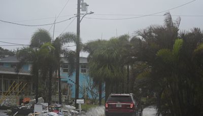 The Latest: Hurricane Milton weakens to Category 1, but danger remains in Florida