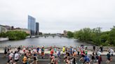 Runner breaks record for 25K race, as thousands take to streets for Amway River Bank Run