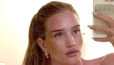 Rosie Huntington-Whiteley poses NAKED in bed