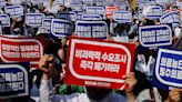 South Korea drops plan to suspend licenses of striking doctors