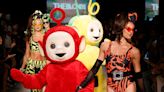 One of the hottest fashion shows of the summer featured metallic swimsuits and Teletubbies dancing down the runway